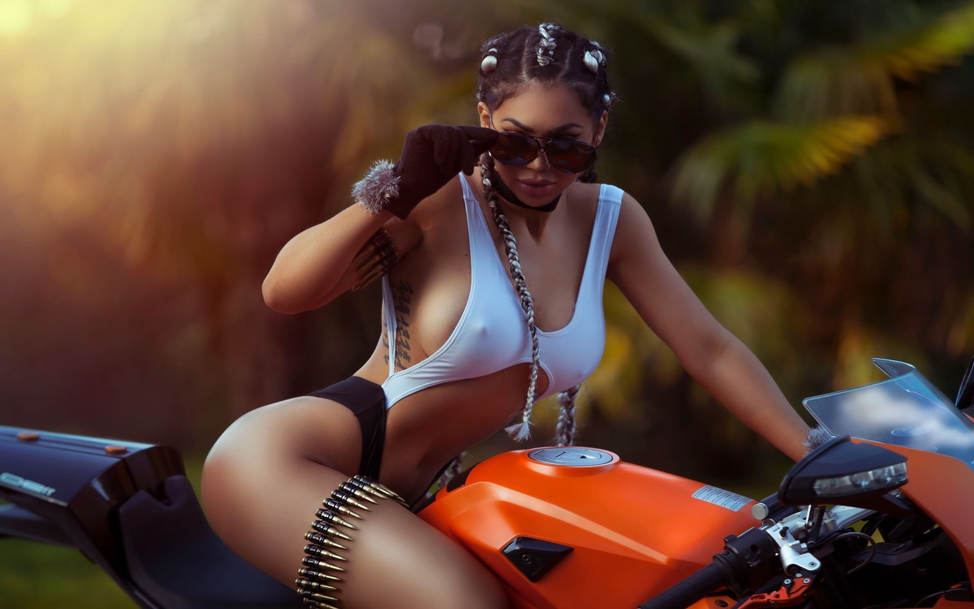 Take a pause and enjoy Girls with tattoos and motorcycles — streaming from Mbuji-Mayi